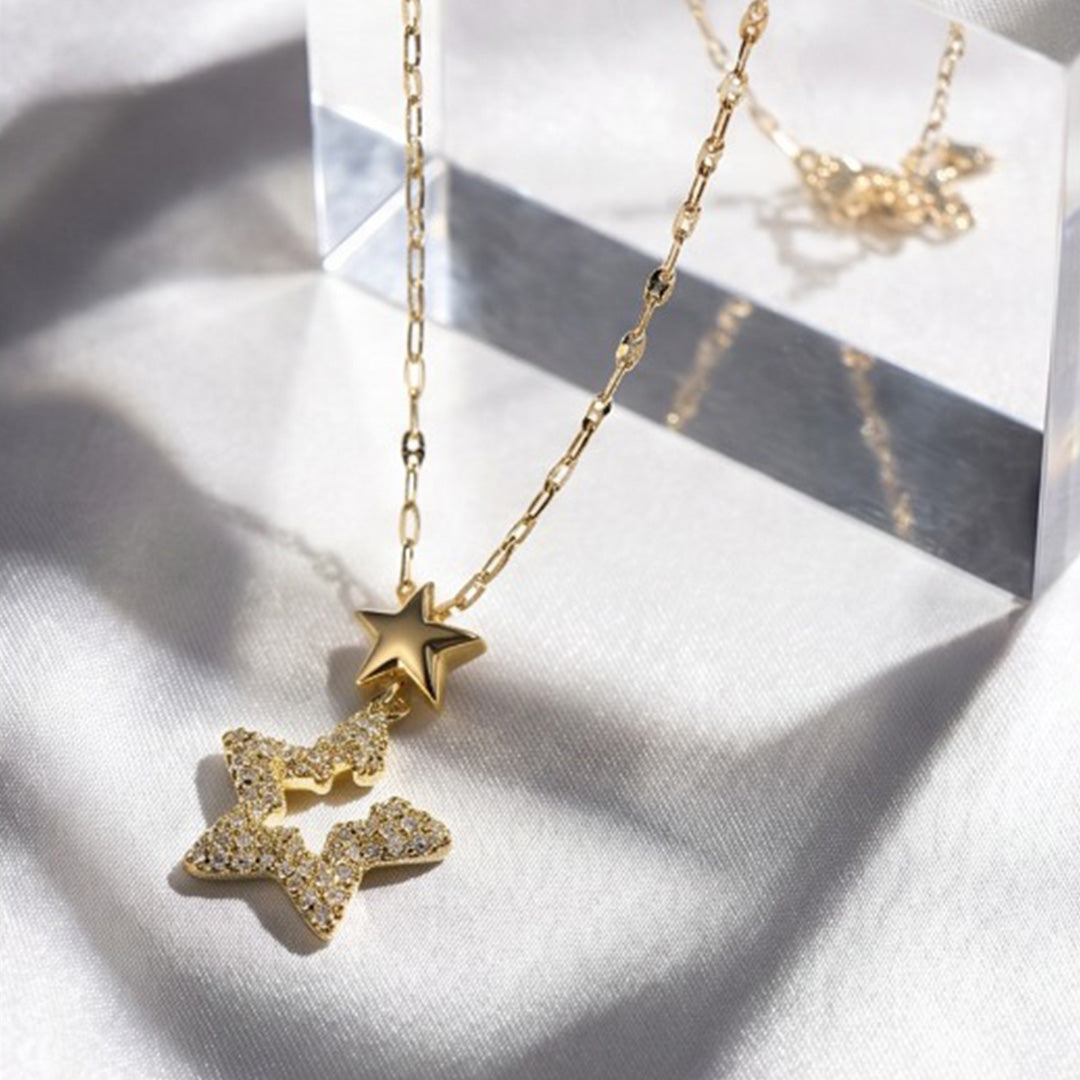 Gold Double Star Pendant Necklace – Pavé Crystal & Polished Star Charm